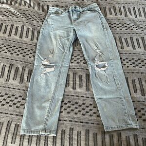 Light ripped straight legged jeans